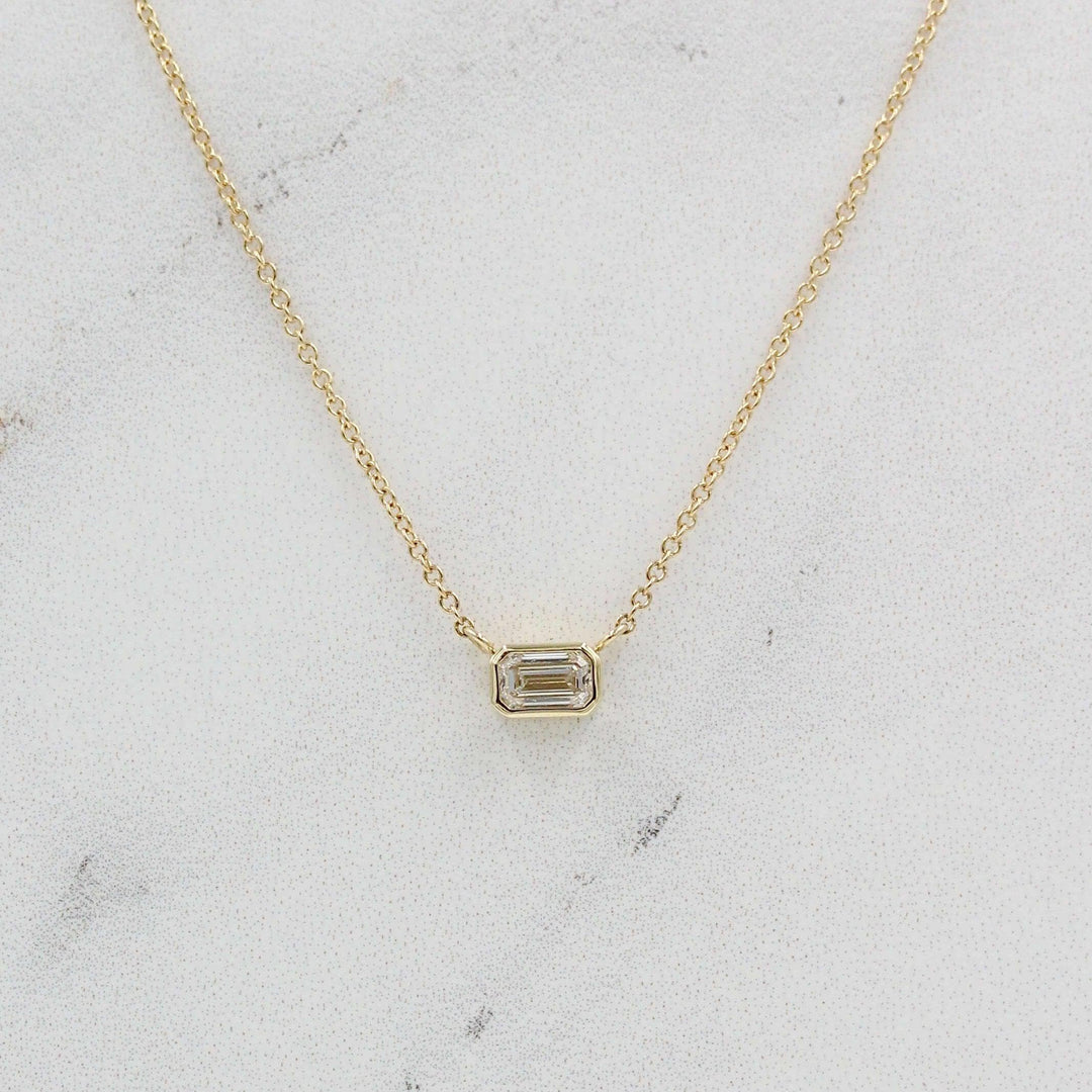 The East-West Emerald Bezel Necklace