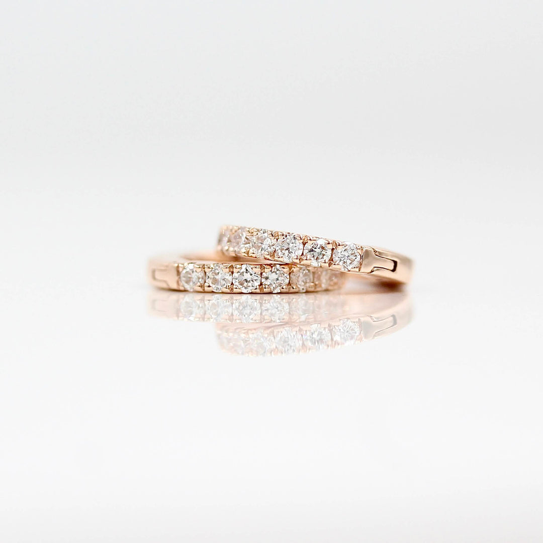 The 10mm Diamond Huggies in Rose Gold against a white background