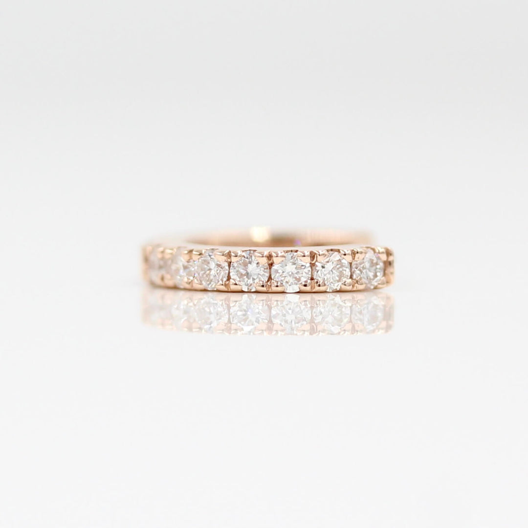 A single 10mm Diamond Huggie in Rose Gold against a white background