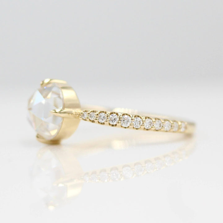 The Aurora Ring (Round) in Yellow Gold with 1.5ct Moissanite against a white background