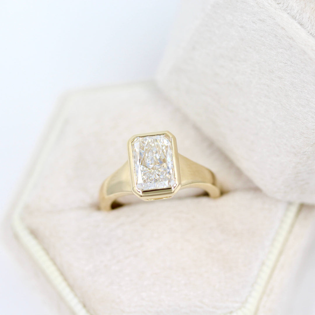 The Billie Ring (Radiant) in Yellow Gold with 2ct LGD in a white velvet ring box