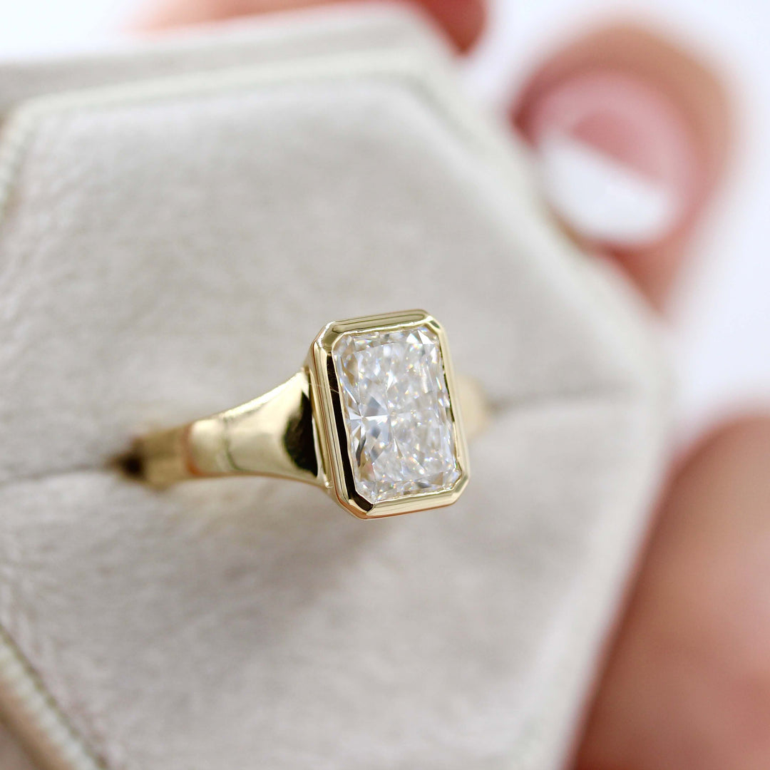 The Billie Ring (Radiant) in Yellow Gold with 2ct LGD in a white velvet ring box