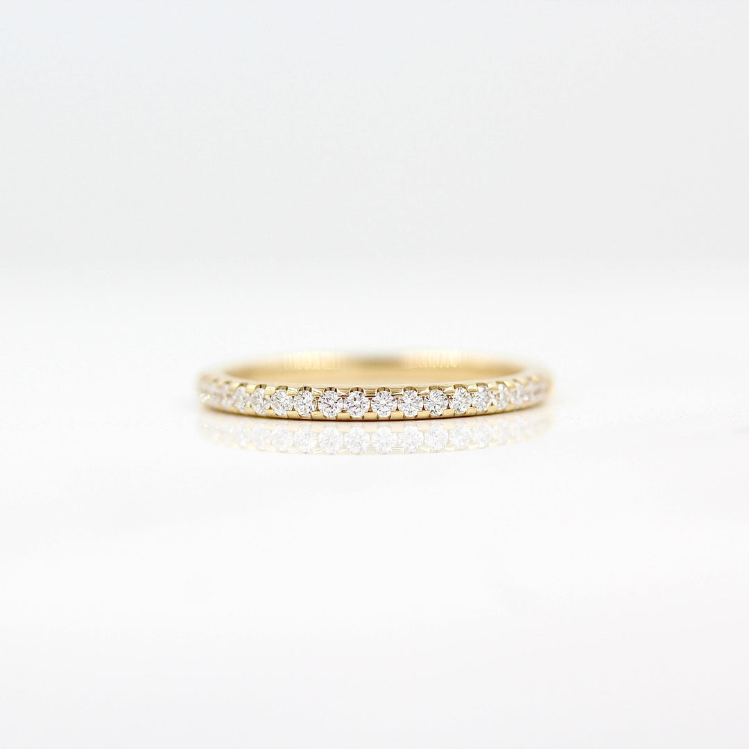 The Lauryn Wedding Band in Yellow Gold against a white background