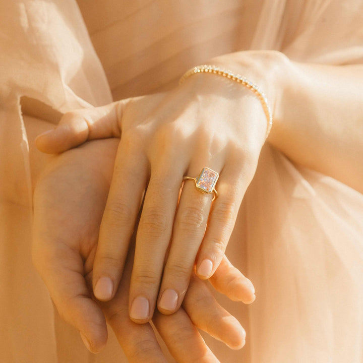 The Stevie Ring (Radiant) in Yellow Gold with 3.5ct Pink Lab-Grown Diamond modeled on a hand