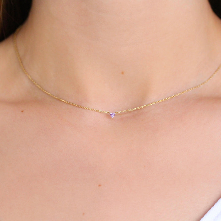 The February Birthstone Tiny Trillion Necklace with Purple Sapphire modeled