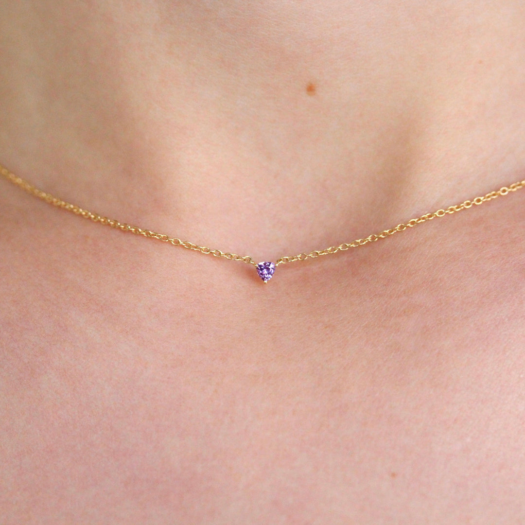 The February Birthstone Tiny Trillion Necklace with Purple Sapphire modeled