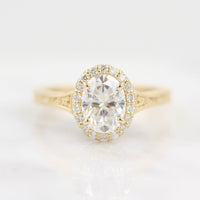 product image of an oval engagement ring with a halo